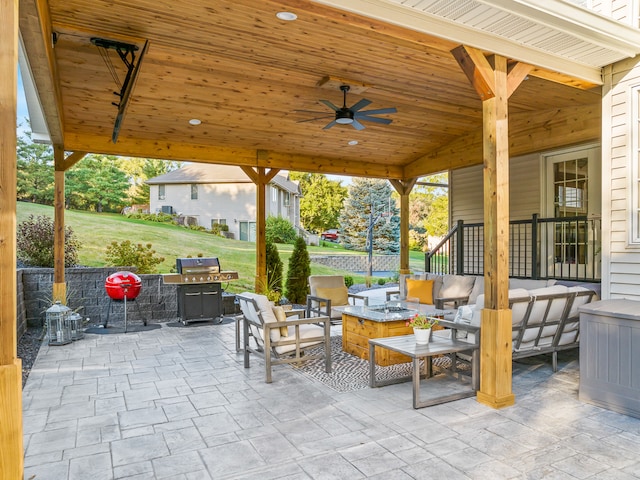 view of patio featuring ceiling fan