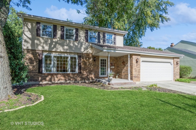 view of front facade with a front yard and a garage