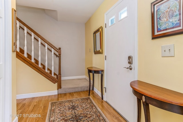 foyer with light hardwood / wood-style flooring