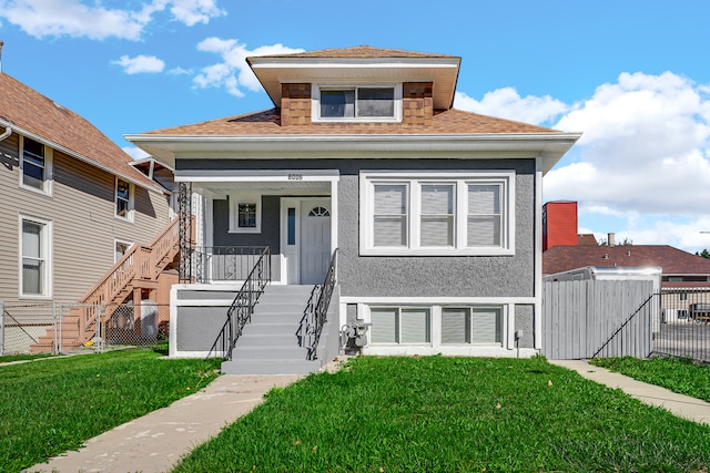 view of front facade with a front yard