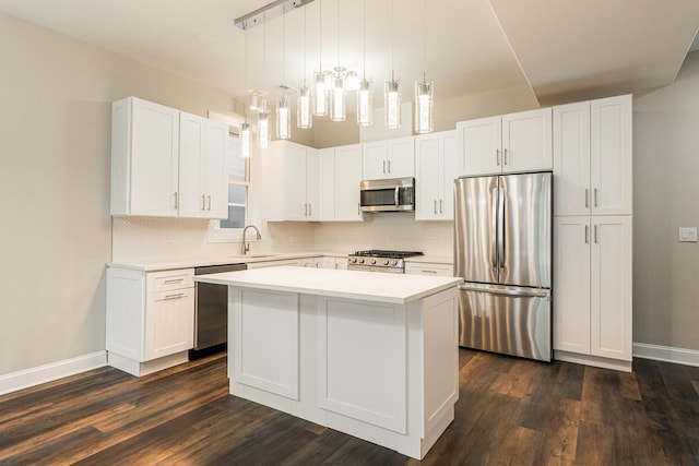 4902 S Vincennes Ave Unit 1, Chicago, IL 60615 - kitchen featuring dark wood finished floors, backsplash, stainless steel appliances, and light countertops