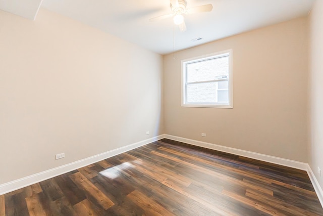 4902 S Vincennes Ave Unit 1, Chicago, IL 60615 - unfurnished room featuring dark wood finished floors, baseboards, a ceiling fan, and visible vents