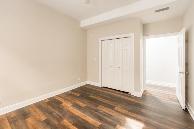 4902 S Vincennes Ave Unit 1, Chicago, IL 60615 - unfurnished bedroom featuring a closet, ceiling fan, baseboards, dark wood-type flooring, and visible vents