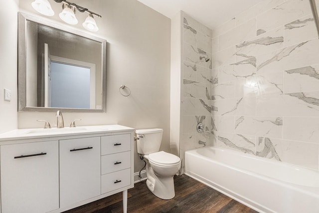 4902 S Vincennes Ave Unit 1, Chicago, IL 60615 - bathroom featuring tub / shower combination, wood finished floors, toilet, and vanity