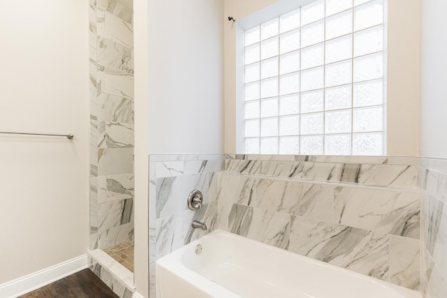 4902 S Vincennes Ave Unit 1, Chicago, IL 60615 - bathroom featuring wood finished floors, a garden tub, baseboards, and a walk in shower