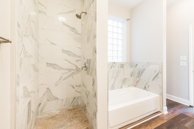 4902 S Vincennes Ave Unit 1, Chicago, IL 60615 - full bath with a bath, baseboards, wood finished floors, and a tile shower