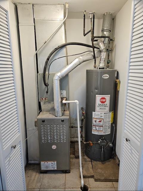 4902 S Vincennes Ave Unit 1, Chicago, IL 60615 - utility room with water heater