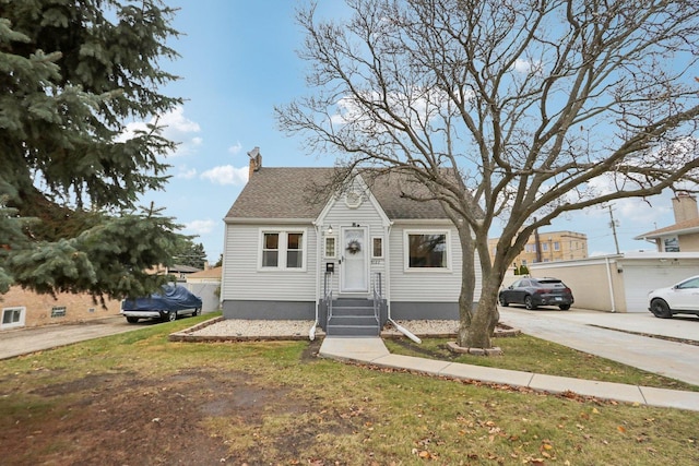 8122 W Oak Ave, Niles, IL 60714 - view of front facade featuring a chimney, concrete driveway, and a front lawn
