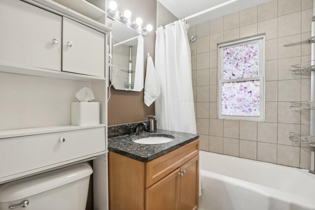 8122 W Oak Ave, Niles, IL 60714 - bathroom featuring toilet, vanity, and shower / tub combo with curtain