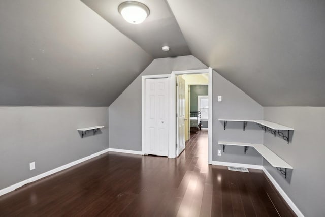 8122 W Oak Ave, Niles, IL 60714 - bonus room with wood finished floors, baseboards, and vaulted ceiling