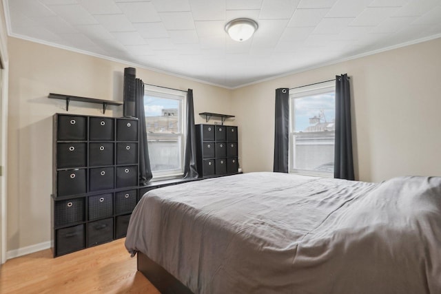 8122 W Oak Ave, Niles, IL 60714 - bedroom with crown molding and wood finished floors