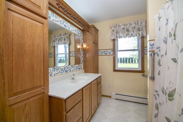 76 S 7000w Rd, Kankakee, IL 60901 - bathroom featuring baseboard heating and vanity