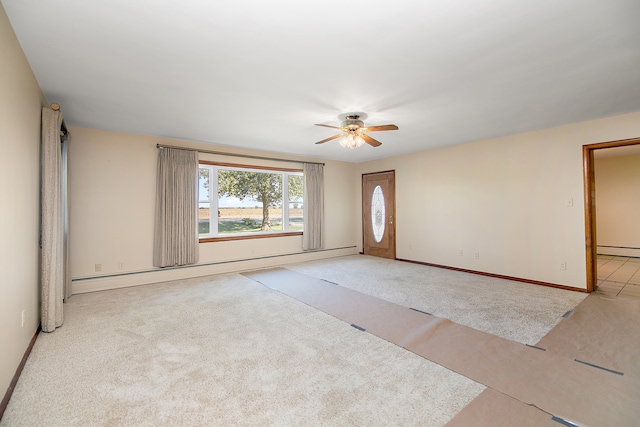 interior space featuring ceiling fan and baseboard heating