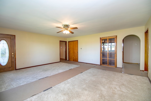 interior space with ceiling fan and a healthy amount of sunlight