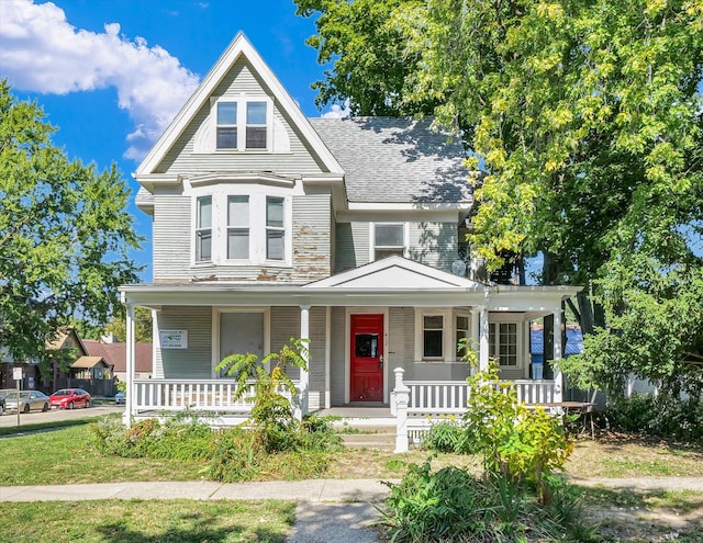 victorian-style house with a porch