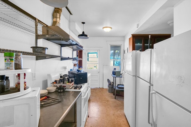 kitchen featuring white cabinets, hanging light fixtures, and white appliances