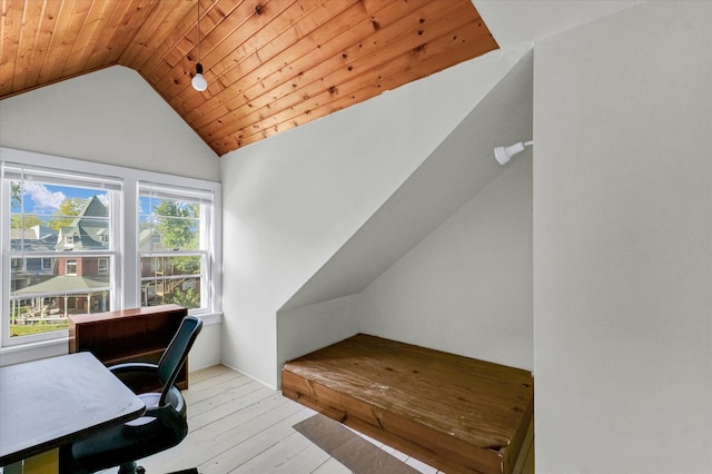 office space featuring wood ceiling, lofted ceiling, and light wood-type flooring