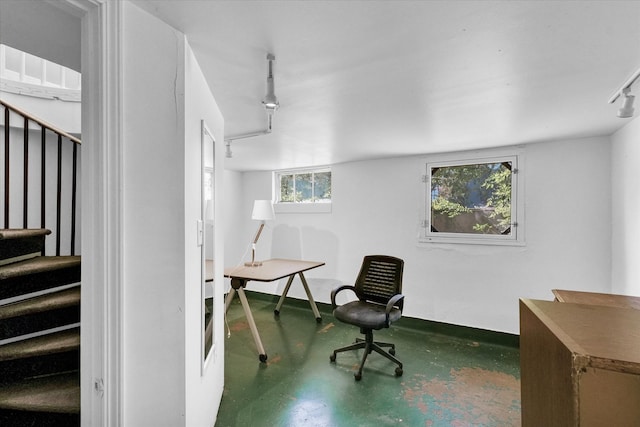 office area featuring concrete flooring