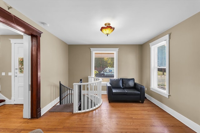 living area with light hardwood / wood-style floors