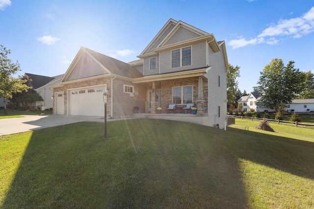 view of front facade with a front yard and a garage