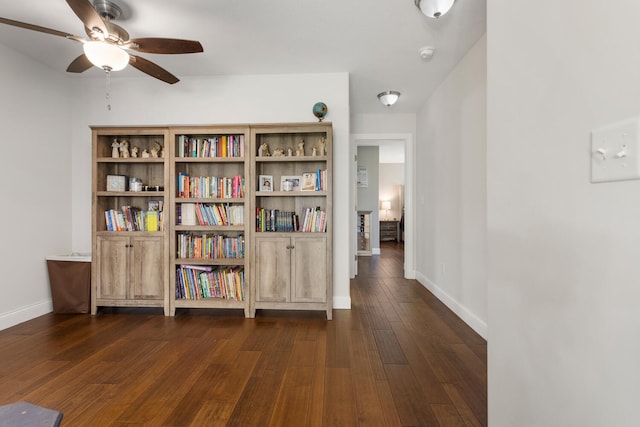 hall with dark hardwood / wood-style floors