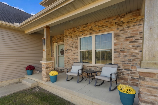 entrance to property featuring covered porch