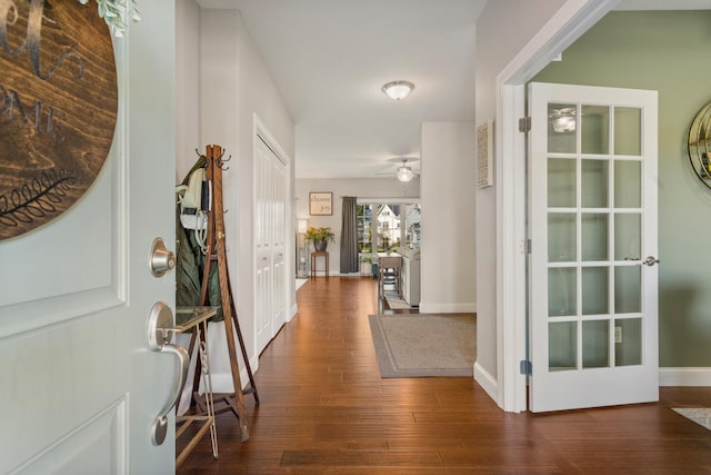 foyer entrance featuring ceiling fan and dark hardwood / wood-style floors