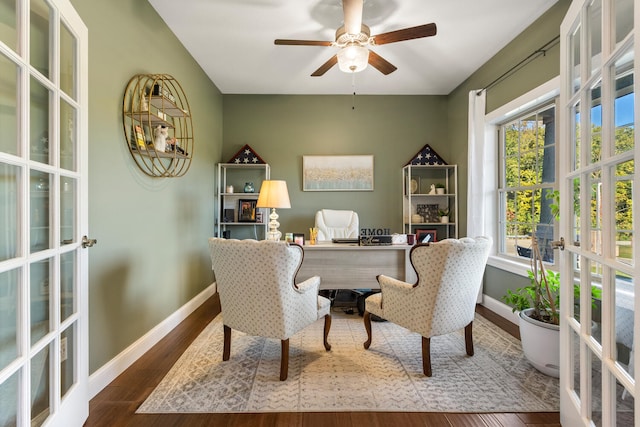 office space featuring ceiling fan, french doors, and hardwood / wood-style floors