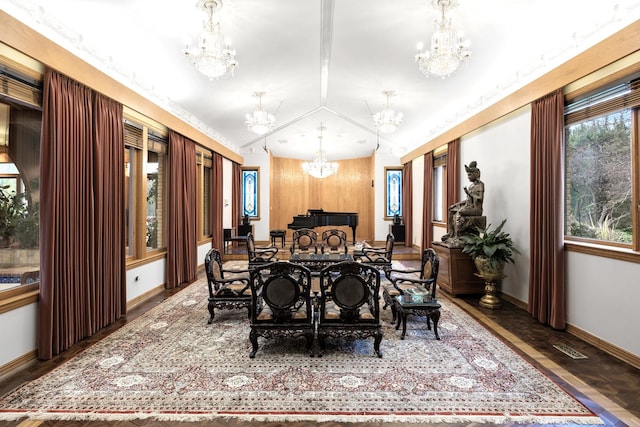 dining space with hardwood / wood-style flooring