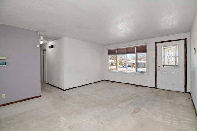 interior space with a textured ceiling