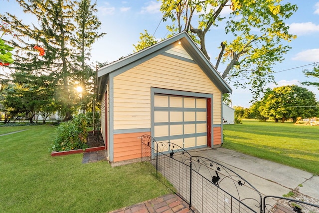 garage with a yard