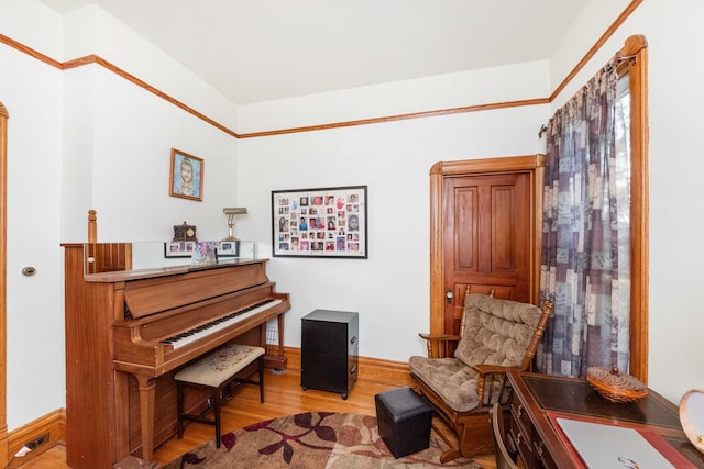 living area with hardwood / wood-style floors