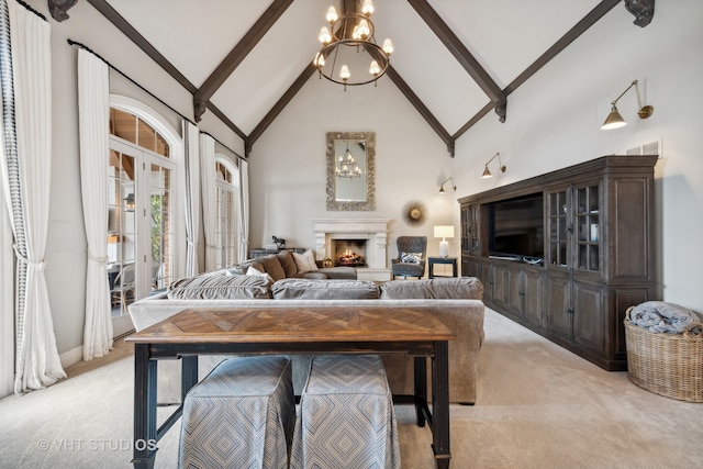 carpeted living room with beamed ceiling, a chandelier, and high vaulted ceiling