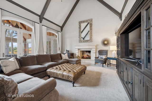 living room featuring beam ceiling, light carpet, and high vaulted ceiling