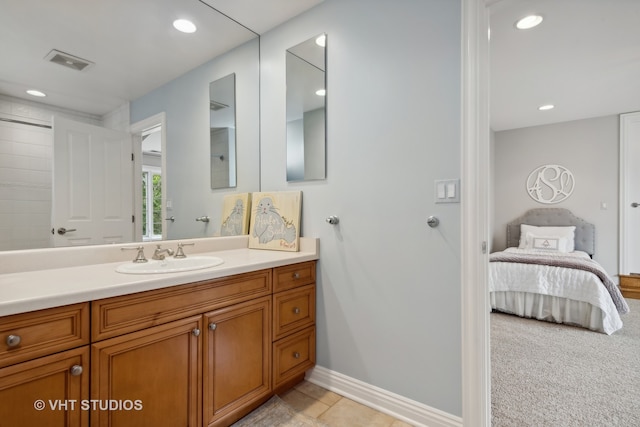 bathroom featuring tile patterned floors and vanity