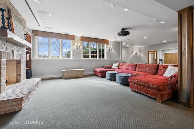 living room with carpet and a fireplace