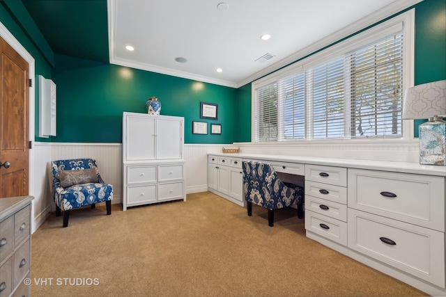 home office featuring light carpet and crown molding