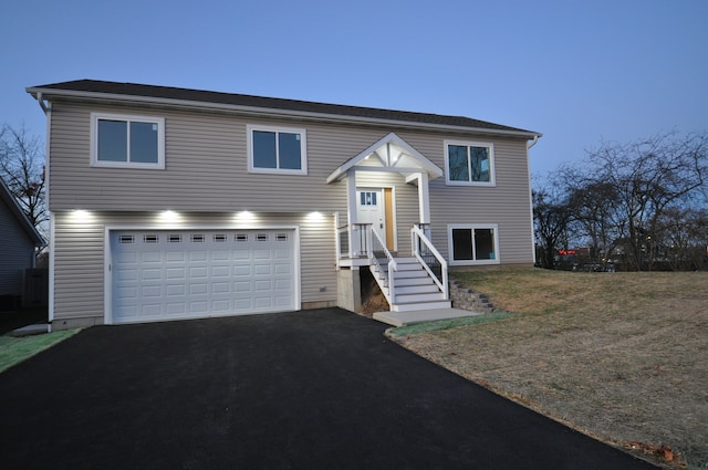 bi-level home featuring a garage