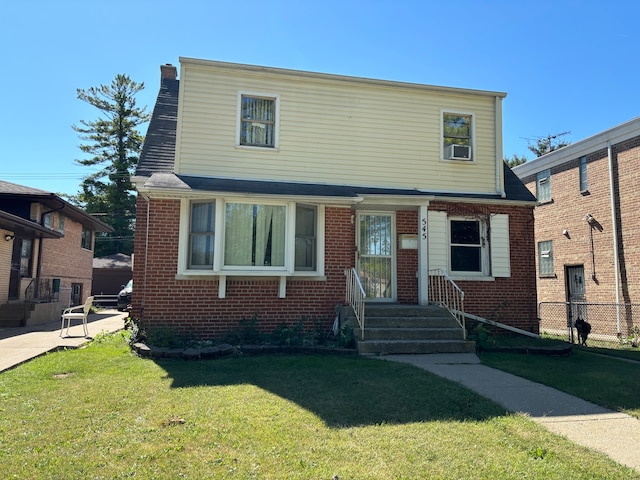 view of front facade featuring a front yard