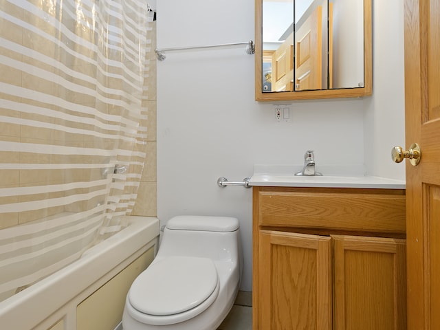 full bathroom featuring shower / bath combo, vanity, and toilet