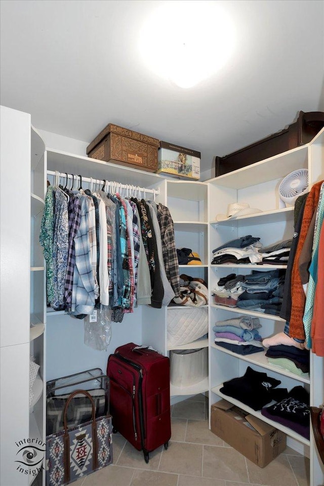 walk in closet featuring tile patterned floors