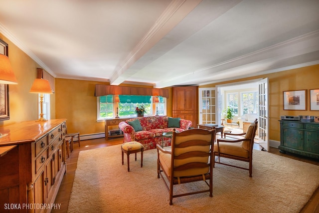 living room featuring ornamental molding, beamed ceiling, baseboards, a baseboard radiator, and light wood-style flooring