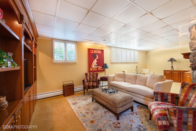 living room featuring crown molding and a baseboard radiator