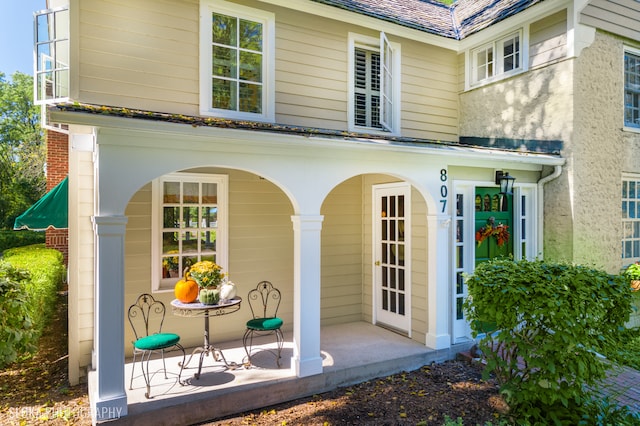 entrance to property with a patio area