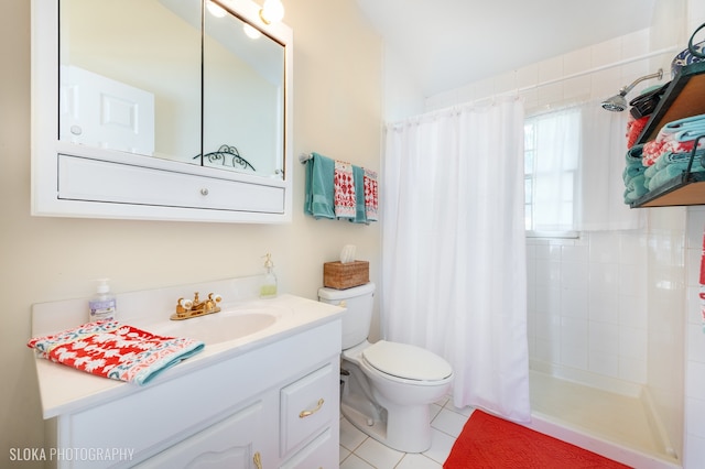 bathroom with tile patterned flooring, vanity, toilet, and curtained shower