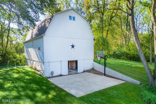 back of property featuring a lawn