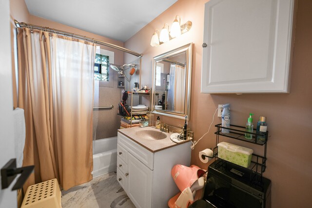 bathroom with vanity and shower / bath combination with curtain