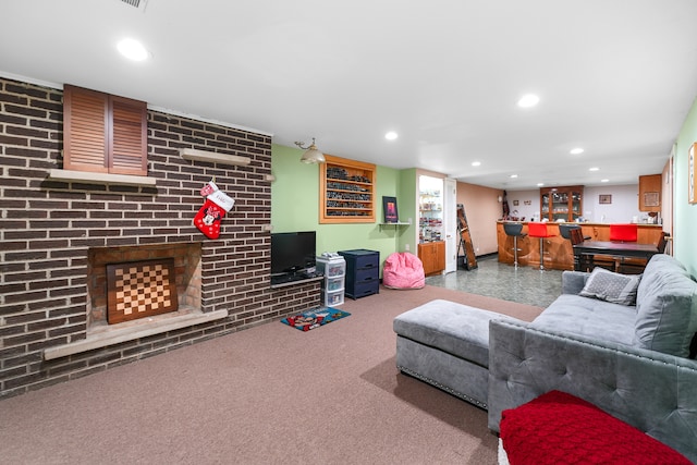 living room with indoor bar, a brick fireplace, and carpet floors