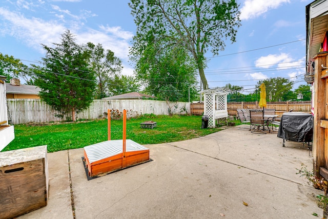 view of patio / terrace featuring area for grilling and an outdoor fire pit