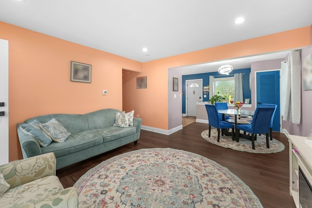 living room with dark wood-type flooring